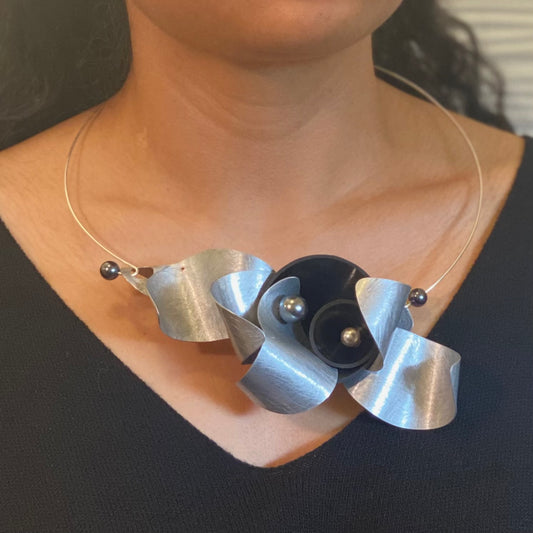 PULSE 1 Feel the Pulsating Sound Waves in this Bold Contemporary Necklace from the SOUND Collection with Recycled Record Vinyl and Simulated Pearls