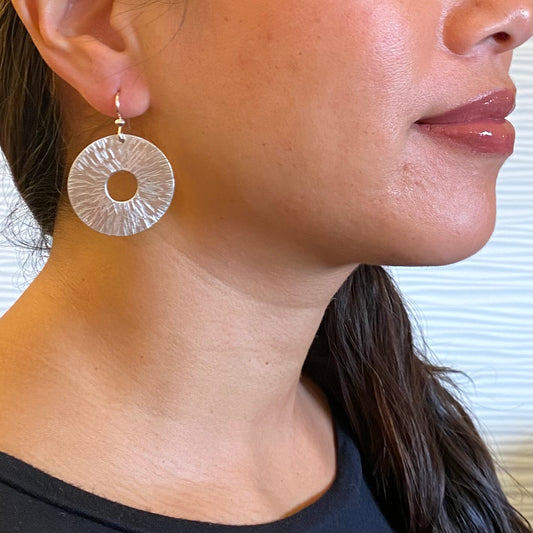 BURST Understated Disc Earrings explode with style
